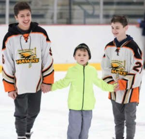 Nathaniel Coulter volunteering at Dix Hills Buddy Skate