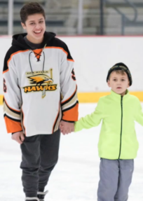 Nathaniel Coulter volunteering at Buddy Skate